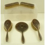 HENRY PERKINS AND SONS A SILVER MOUNTED TORTOISESHELL DRESSING TABLE SET comprising; a hand mirror