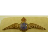 A WORLD WAR II RAF SWEETHEART BROOCH, in brass with enamel decoration of wings with central "RAF"