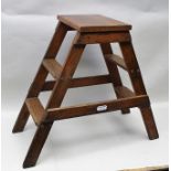 A SET OF "SLINGSBY" PITCH PINE TWO-TREAD STATIC STEPS, impressed mark "Panel Shop"