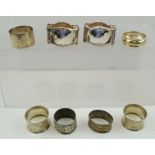 A SELECTION OF SILVER AND SILVER COLOURED METAL ENGLISH AND CONTINENTAL NAPKIN RINGS to include; two