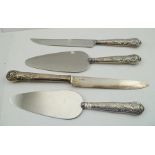 FOUR SILVER HANDLED SERVING ITEMS comprising; two Queens pattern cake slices and a cheese knife with