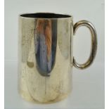 CASTELBERG & CO. A PLAIN SILVER MUG having sheet rolled, lightly tapered conical body with rolled