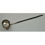 MAKER'S MARK RUBBED A GEORGE III SILVER PUNCH LADLE having plain oval bowl, inset with the king's