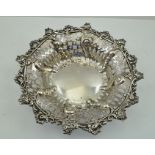 MAKER'S MARK OBSCURED A VICTORIAN SILVER BONBONNIERE having floral and cast scroll wire rim with