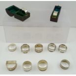 A COLLECTION OF TWELVE NAPKIN RINGS, various, some monogrammed, some un-engraved, mixed assays,