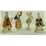 A COLLECTION OF FOUR LATE 19TH CENTURY STAFFORDSHIRE FIGURINES, polychrome painted, includes