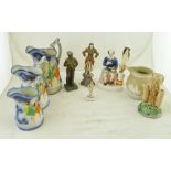 A CONTINENTAL CERAMIC FIGURINE 19cm high, together with A QUANTITY OF POTTERY JUGS and a