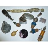 A COLLECTION OF SMALL DECORATIVE WARES including; a ceramic walnut form scent bottle, a seal and