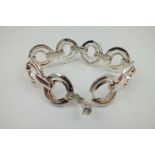 "OLD FLORENCE" AN ITALIAN DESIGNER SILVER BRACELET, of eight circular within smaller circle design