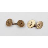 A PAIR OF 9CT GOLD CUFFLINKS, of oval form with chain links, initialled, weight 4g