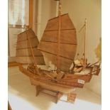 A HAND BUILT WOODEN MODEL CHINESE JUNK (recently caught in a squally storm!)