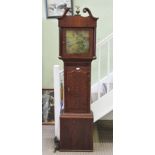 A 19TH CENTURY OAK LONGCASE CLOCK, having swan neck pediment, pilaster sides, the engraved brass