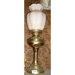 A VICTORIAN DESIGN BRASS OIL LAMP with opaque fluted shade