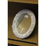 A LATE 19TH CENTURY BLANC DE CHINE ROYAL CROWN DERBY FLORAL ENCRUSTED OVAL MIRROR FRAME, from the