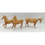 THREE BESWICK CERAMIC PALOMINO HORSES, two matt finished, one gloss finished (3)