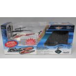 A PICOOZ MODEL HELICOPTER with remote control Channel A in original vendor's box (unused)