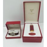 A "MUST DE CARTIER" SILVER GILT WRIST WATCH, brown central face, quartz movement, brown leather