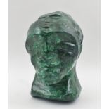 AN AFRICAN CARVED MALACHITE STATUE, head of a man, 13cm high