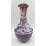 A RUSKIN POTTERY HIGH-FIRED STONEWARE VASE BY WILLIAM HOWSON TAYLOR, having turned flared rim