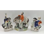 A 19TH CENTURY STAFFORDSHIRE CERAMIC FIGURE "Garibaldi" beside his horse, 23cm high, together with a