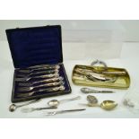 A SET OF SIX SILVER HANDLED TEA FORKS, each having hallmarked pressed filled handle and various