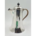 HUKIN & HEATH, DESIGNED BY CHRISTOPHER DRESSER A SILVER PLATED COFFEE POT, of plain flared form,