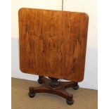 A WILLIAM IV ROSEWOOD TILT-TOP SUPPER TABLE having square top, on carved baluster column with