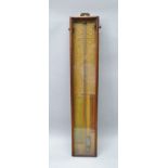 AN ADMIRAL FITZROY TYPE BAROMETER, in a mahogany framed case, with printed text background and