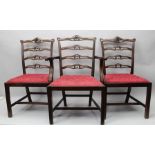 A SET OF FIVE CHIPPENDALE DESIGN MAHOGANY DINING CHAIRS with decorative pierced splats,