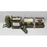 FOUR ITEMS OF CIVIL DEFENCE EQUIPMENT, includes; two field telephones MkI, a gas mask in tube and