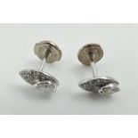 A PAIR OF DIAMOND SET ELIPTICAL EARRINGS (for pierced ears), considered to be white gold mounted, in