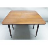 A 19TH CENTURY MAHOGANY PEMBROKE TABLE having twin flap top, having two opposing cutlery drawers,