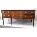 A 19TH CENTURY MAHOGANY GEORGIAN DESIGN SIDEBOARD fitted two deep drawers, having faux double drawer