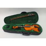 A 1/8TH SIZE CHILD'S CHINESE VIOLIN, 9.25" back, with bow in black vinyl case