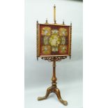 A VICTORIAN MAHOGANY FRAMED POLE SCREEN, the Berlin bead and wool work panel inset frame with turned