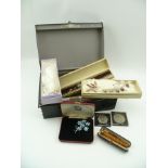 A 9CT GOLD BANDED AMBER CHEROOT HOLDER in original case, together with a quantity of COSTUME