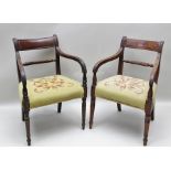 A MATCHED SET OF TEN REGENCY MAHOGANY DINING CHAIRS, of rope twist form, comprising two open arm