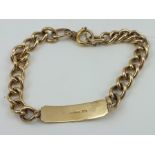 A 9CT GOLD IDENTITY BRACELET, plain bar, with chain links, 31g.