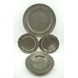 A PEWTER PLATTER, with touch marks to verso, 38cm, together with OTHER PEWTER PLATES