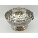 A GEORGIAN DESIGN SILVER ROSE BOWL, having fitted mesh cover, with lion mask ring handles, on a