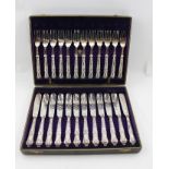 MAPPIN & SON A SET OF TWELVE SILVER HANDLED "KING'S" PATTERN FISH KNIVES AND FORKS, cased, Sheffield