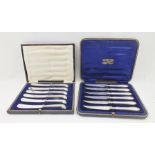 A CASED SET OF SIX SILVER PISTOL HANDLED TEA KNIVES, Sheffield 1922, together with ONE OTHER CASED