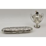 WILLIAMS (BIRMINGHAM) AN EDWARDIAN SILVER CIGAR LIGHTER of twin-handled urn form with swag