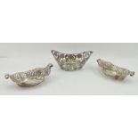 A PAIR OF LATE VICTORIAN SILVER BONBON DISHES by Mappin Brothers, having pierced and cast