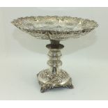 ELKINGTON & CO. AN EDWARDIAN SILVER COMPORT, having pierced and repousse dish top, on a shaped