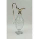 AN 18TH CENTURY SILVER MOUNTED OIL CONDIMENT JUG, having cut lead crystal body on square base,