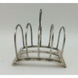 HUKIN & HEATH AN ART DECO SILVER TOAST RACK, Birmingham 1935, 138g.