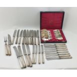 A CASED SET OF TWELVE FRENCH SOUP SPOONS, and TWENTY-FOUR CHRISTOFLE STEEL BLADED KNIVES