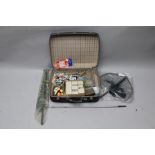 A CASE OF FISHING EQUIPMENT, includes flies, lures, nets, two priests, etc.