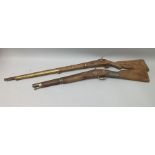 ONE PERCUSSION CARBINE WALL HANGER of Eastern manufacture, and ONE SHORT MUSKET of Eastern